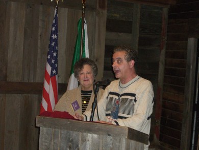 Man and woman ad podium