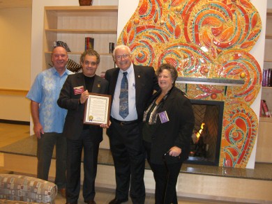 Group picture at Milpitas Senior Center - holding framed document